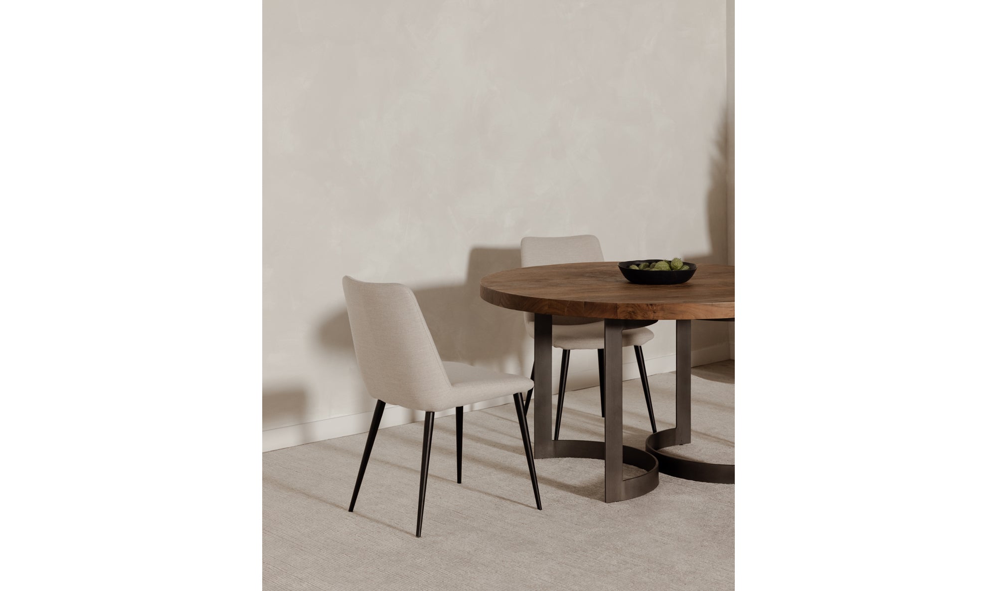 BENT ROUND DINING TABLE