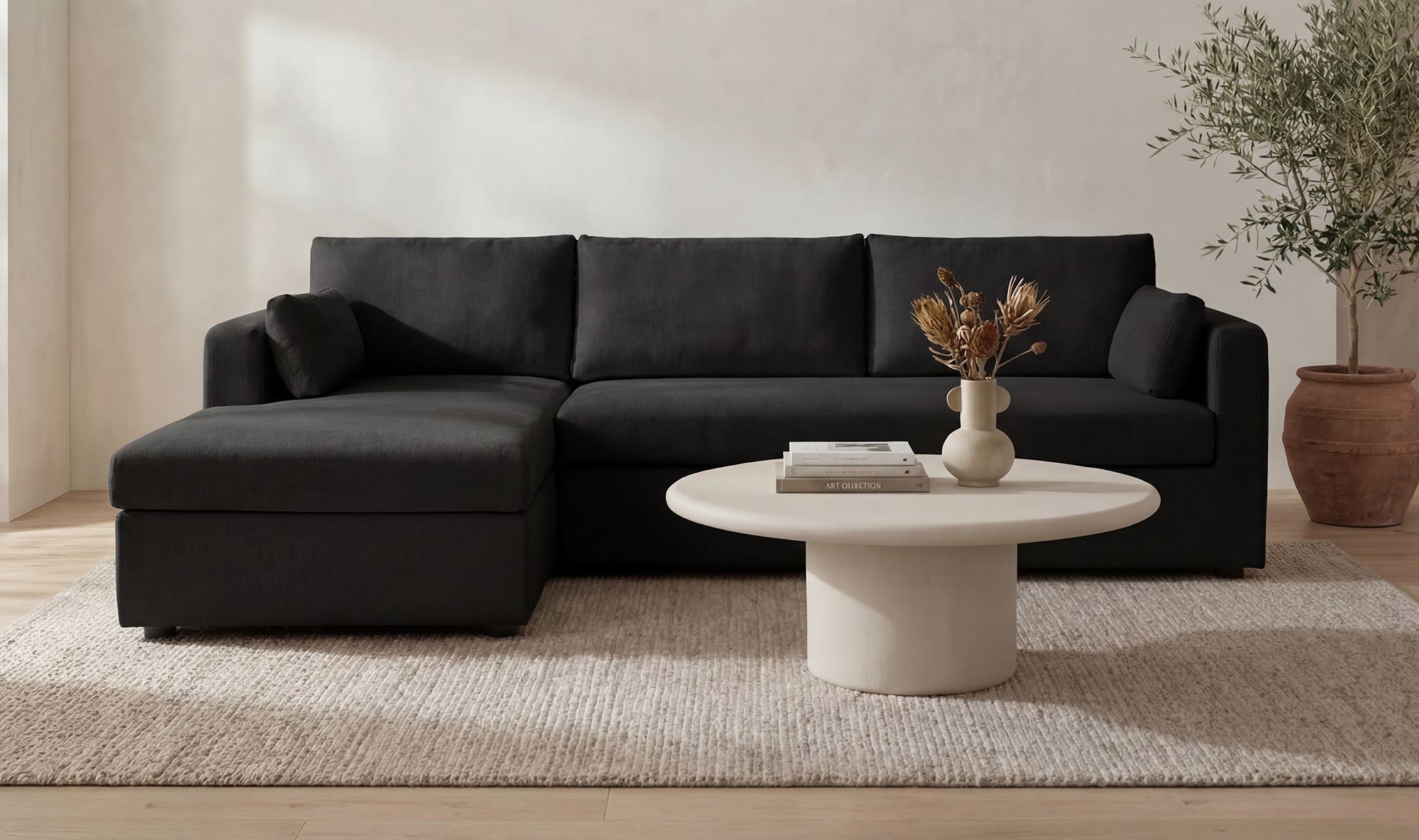115.75" Black Upholstered Sleeper Storage Chaise Left Facing Sectional